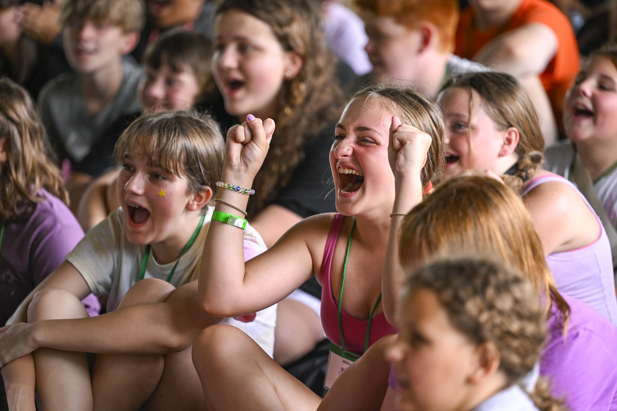 main page header image showing many young people of different youth ages shouting and laughing